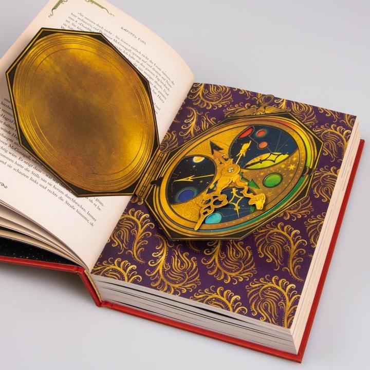 Actual product image Harry Potter und der Stein der Weisen: MinaLima-Ausgabe (Harry Potter 1) (German, MinaLima, J.K. Rowling, Klaus Fritz, 2021)
