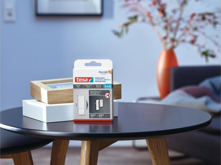 Image du produit tesa Powerstrips pour papier peint et plâtre, capacité de maintien de 0,5kg, 9x bandes adhésives double