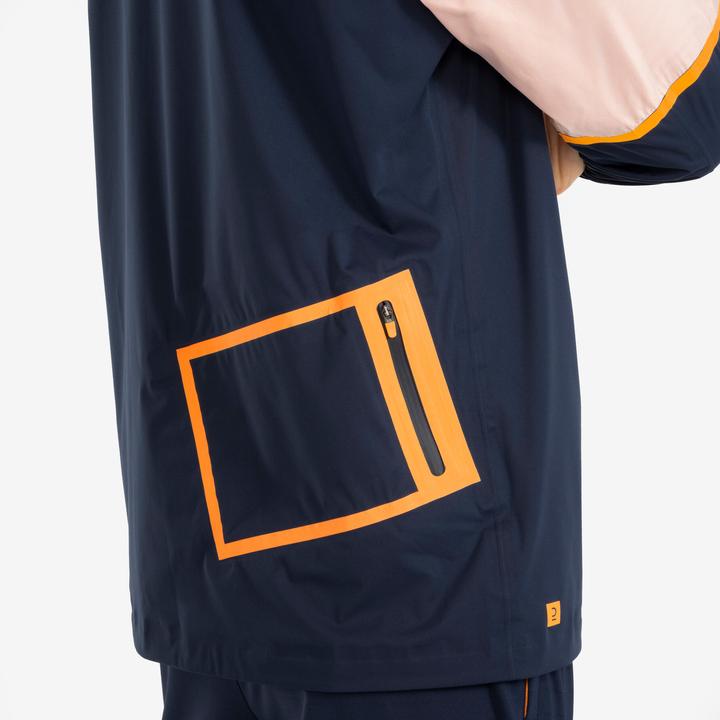 Produktbild Kipsta Damen/Herren Fussball Regenjacke - CLR marineblau/orange (XS)