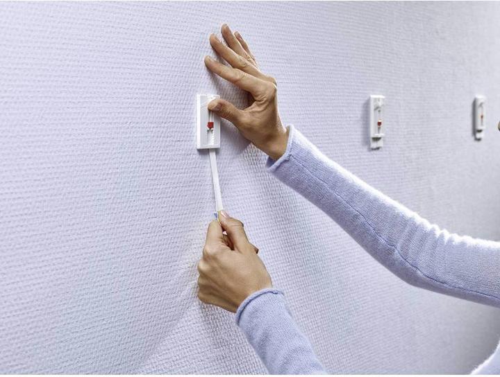 Actual product image tesa Klebehaken Verstellbarer Klebenagel für Tapeten und Putz