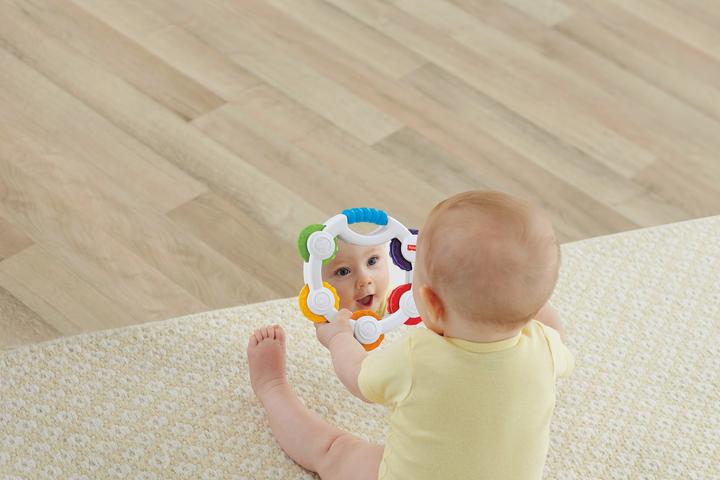 Produktbild Fisher-Price Babys erstes Tamburin (Französisch, Italienisch, Englisch, Spanisch, Finnisch, Niederländisch, Griechisch, Deutsch)