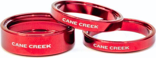 Actual product image Cane Creek Interlok Spacer Kit, 2x5mm, 1x10mm, red
