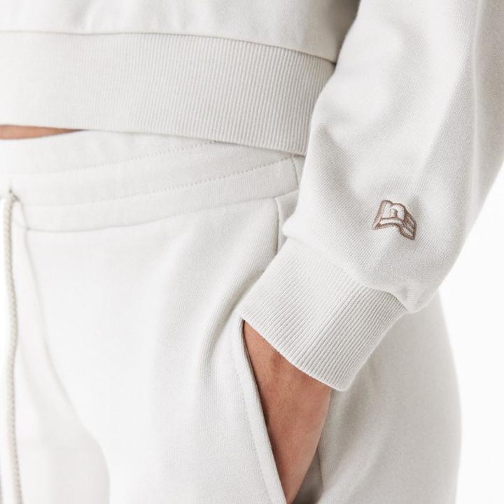 Immagine prodotto New Era Felpa con cappuccio in pile da donna beige pietra - L (L)