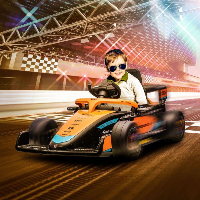 Produktbild Swisshandel24 McLaren Kinderauto, 2-Gang, 2 Motoren, Fernbedienung, MP3 USB, Federung, 3-5 Jahre, bis 30kg, Orange (12 V)