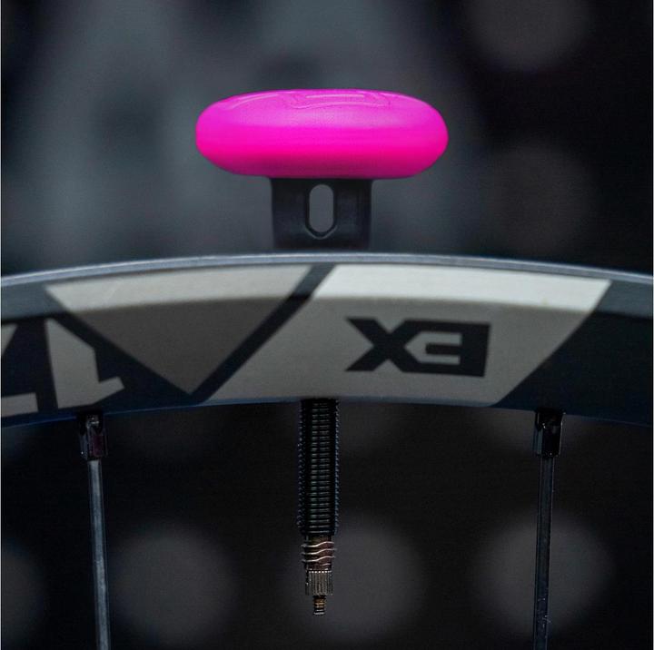Actual product image Muc-Off Tubeless Secure Tag Holder pink/black