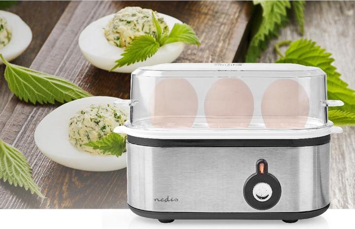 Actual product image Nedis Egg boiler - Lid & holder are dishwasher safe - Egg holder with measuring cup - Soft, With (EU plug)