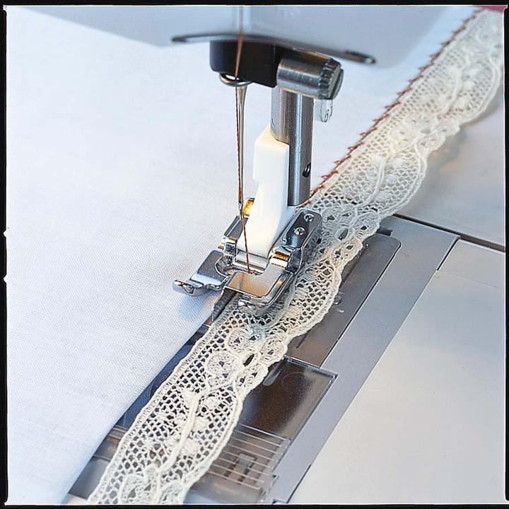 Actual product image Husqvarna Edgestitch foot with ruler in the centre