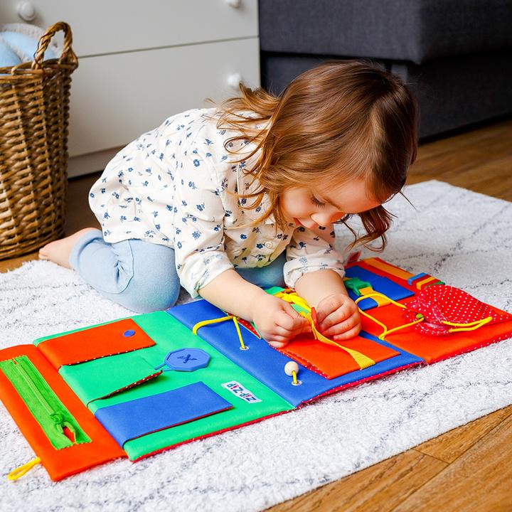 Actual product image Busy board (German, French, Italian, English)