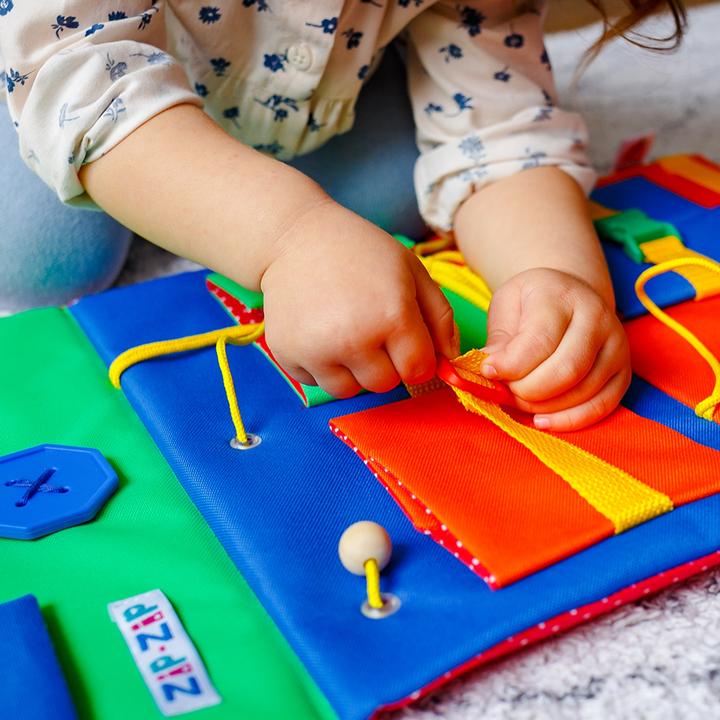 Actual product image Busy board (German, French, Italian, English)