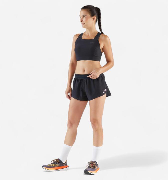 Immagine prodotto Kiprun Laufshirt Crop Top Damen leicht - Race Crop Light 900 schwarz Méline Rollin (S)