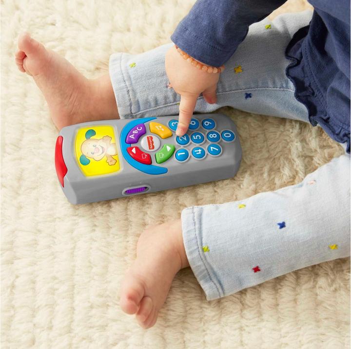 Actual product image Fisher-Price Learning fun doggie remote control educational toy for babies and toddlers with music and lights (German)