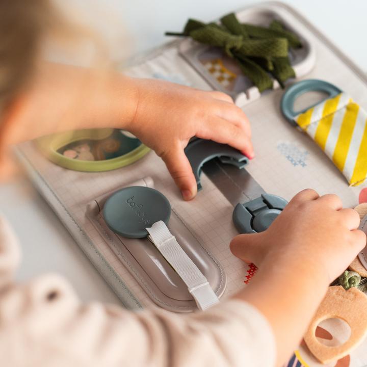 Immagine prodotto Taf Toys Busy Board Snap 'n Learn