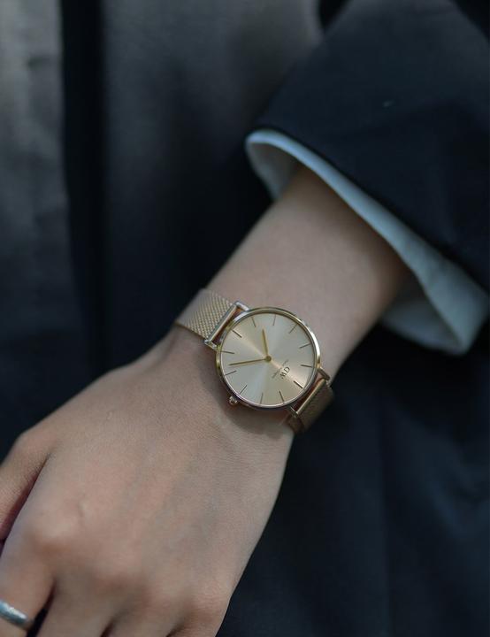 Actual product image Daniel Wellington Classic Petite Unitone Gold (32 mm) (Analogue wristwatch, 32 mm)