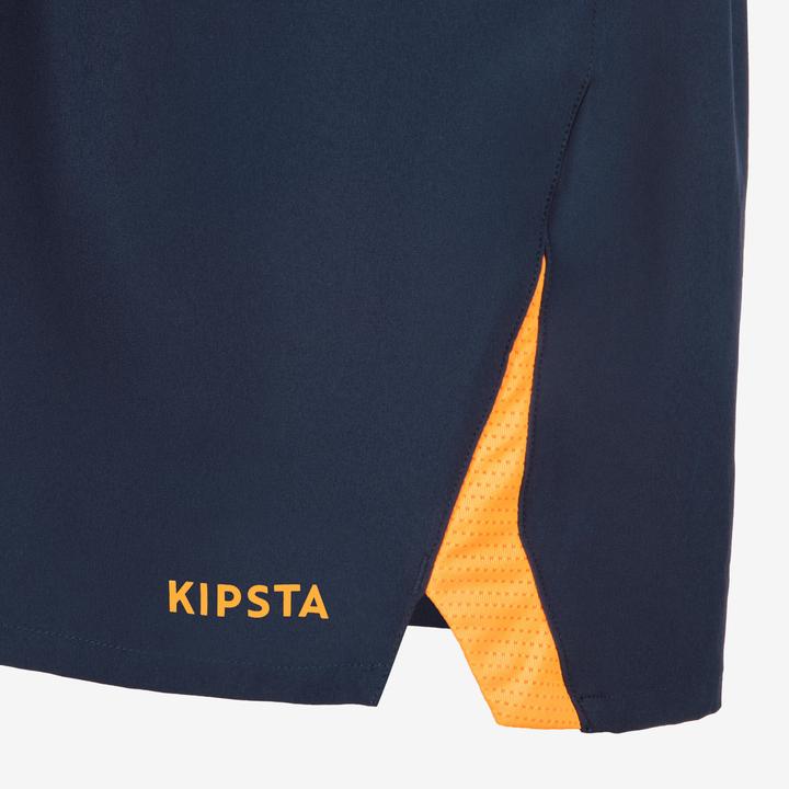 Immagine prodotto Kipsta Pantaloncini da calcio da donna/uomo - CLR blu navy/arancio (XS)