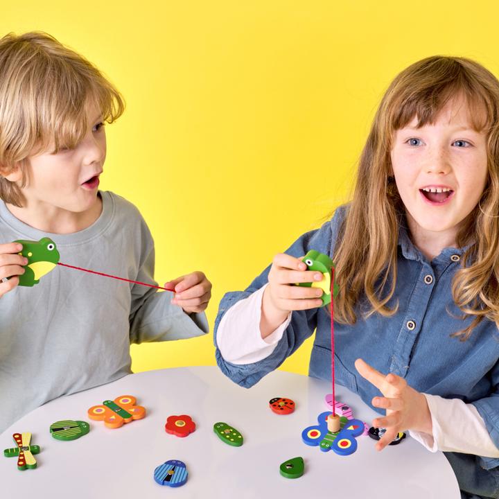 Actual product image Kikkerland Catch a Bug Wooden Fishing Game (French, German, Portuguese, Spanish, Dutch, Italian, Icelandic, English)