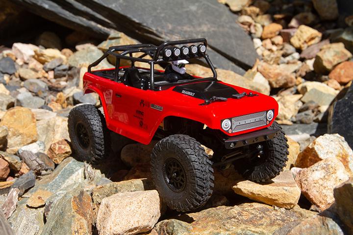 Image du produit Axial SCX24 Deadbolt Electric Brushed Crawler 4WD 1:24 RTR rouge (RTR Prêt à fonctionner)