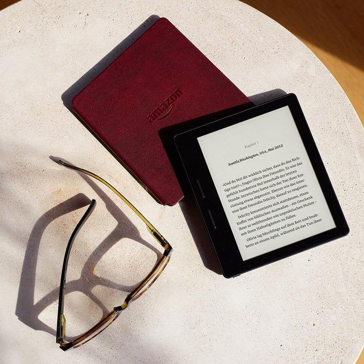 Produktbild Amazon Kindle Oasis + Ladehülle aus Leder - Special Offers (6", 4 GB, Bordeaux)