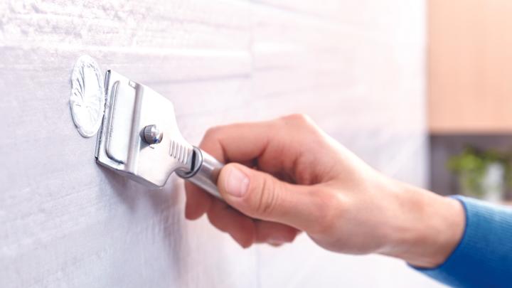 Actual product image tesa EKKRO hairdryer holder incl. adhesive solution without drilling