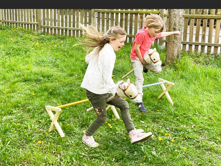 Actual product image small foot Cavaletti obstacle set for children (German, Italian, French, English, Spanish)