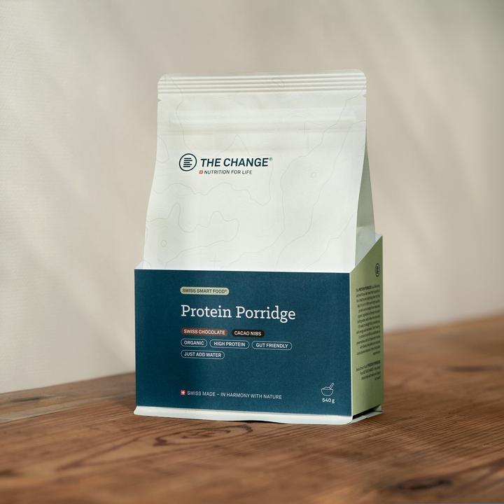 Actual product image BE THE CHANGE Protein Porridge BIO Swiss Chocolate Cacao Nibs (540 g)
