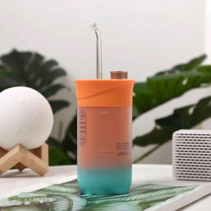 Image du produit OEM Consumer electronics Electric oral irrigator 200 ml 4 tips RC-K-563 orange