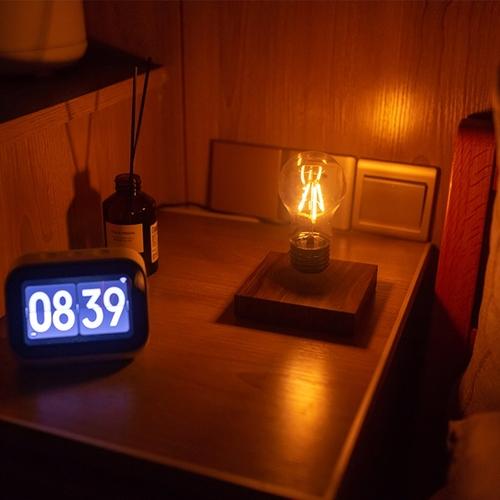 Immagine prodotto Geschenkidee Lampadina LED galleggiante con base in legno