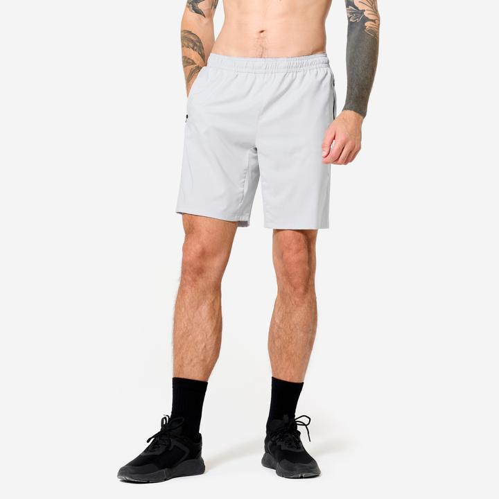 Image du produit Domyos Short de fitness respirant poches zippés homme, gris perle (XL)