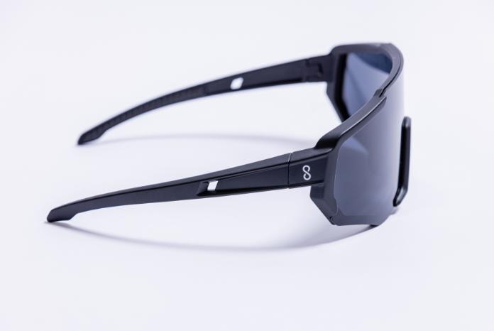Actual product image Coast Optics Nita sports glasses Black with Black Sun and clear lens (Black, Lucid, Black Sun)
