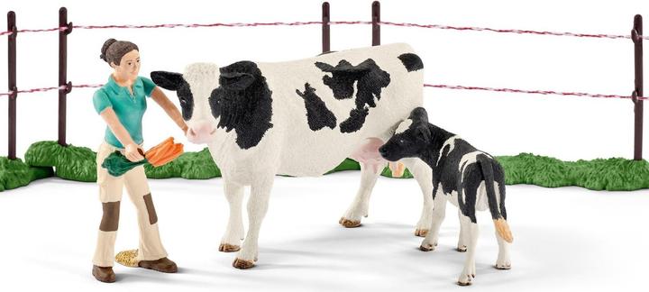 Immagine prodotto Schleich Famiglia di mucche al pascolo