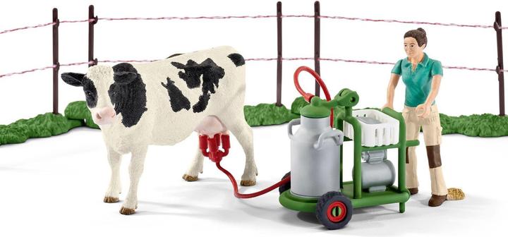 Immagine prodotto Schleich Famiglia di mucche al pascolo