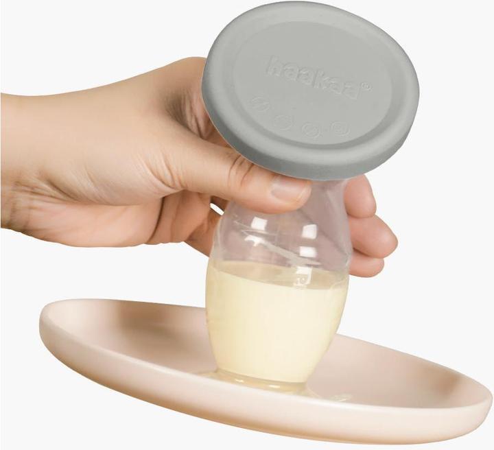 Produktbild Haakaa Muttermilchpumpe mit Saugfuss 100ml + Silikondeckel Set