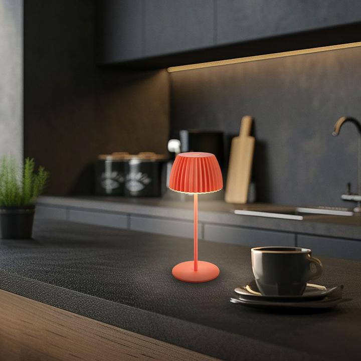 Actual product image Briloner Brilo unplugged RIFFLE Akku Mini Tischleuchte mit Lichtkante - Orange (150 lm)