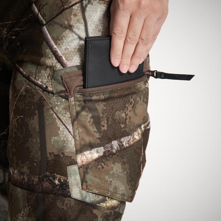 Image du produit Solognac Pantalon de pluie de chasse Treemetic 500 Femmes chaud imperméable silencieux Camouflage (34)