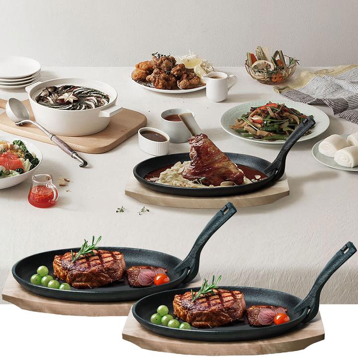 Image du produit Casativo Lot de 2 poêles à servir professionnelles en fonte avec dessous de plat en bois, 24 x 14 x 2,2 cm (Ensemble de casseroles et de poêles de cuisson, Fonte)