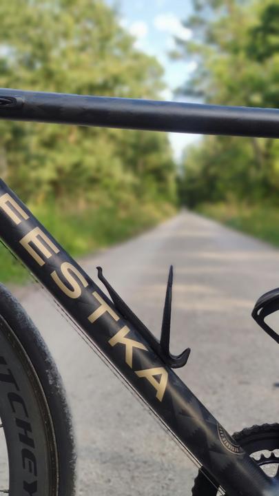 Actual product image NG Sports Thymeen bottle cage, Nylon + Carbon, ultralight, black matte