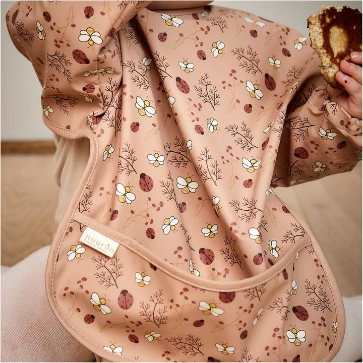 Actual product image Nuuroo Luna Bib Coated Sand - Flower bee