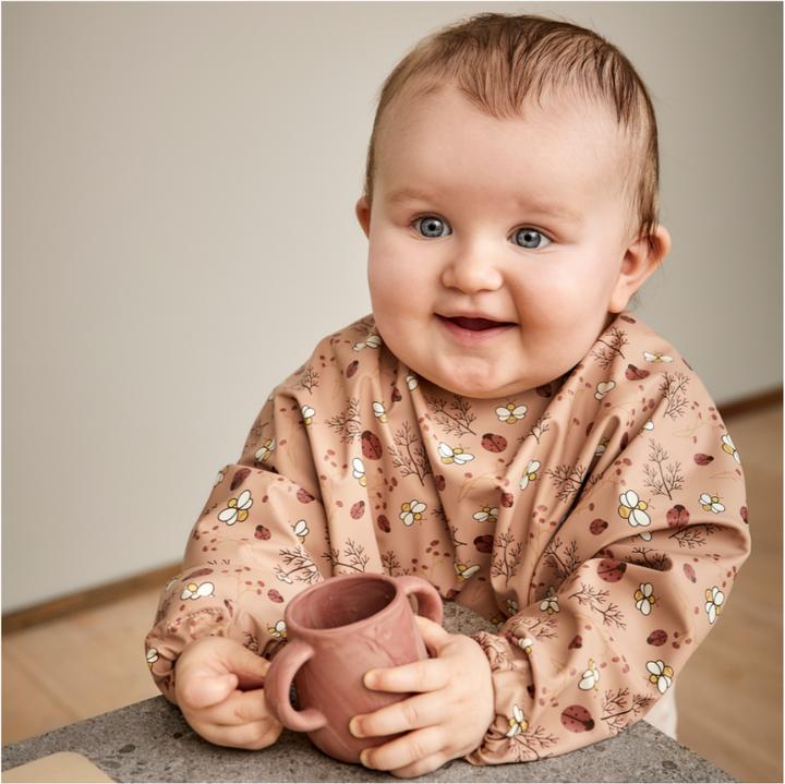 Actual product image Nuuroo Luna Bib Coated Sand - Flower bee