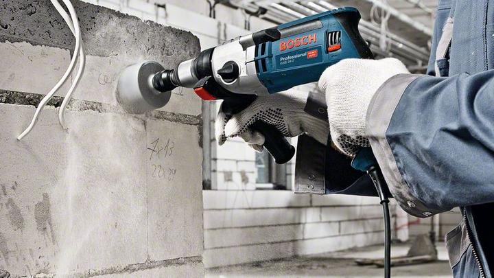Immagine prodotto Bosch Professional Trapano a percussione GSB 24-2, con set di punte per legno da 7 pezzi, set di seghe a tazza (Corrente elettrica)