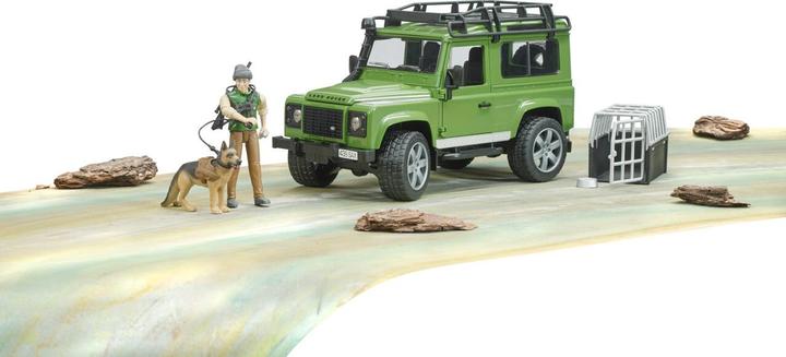 Produktbild Bruder Land Rover Defender Station Wagon mit Förster und Hund