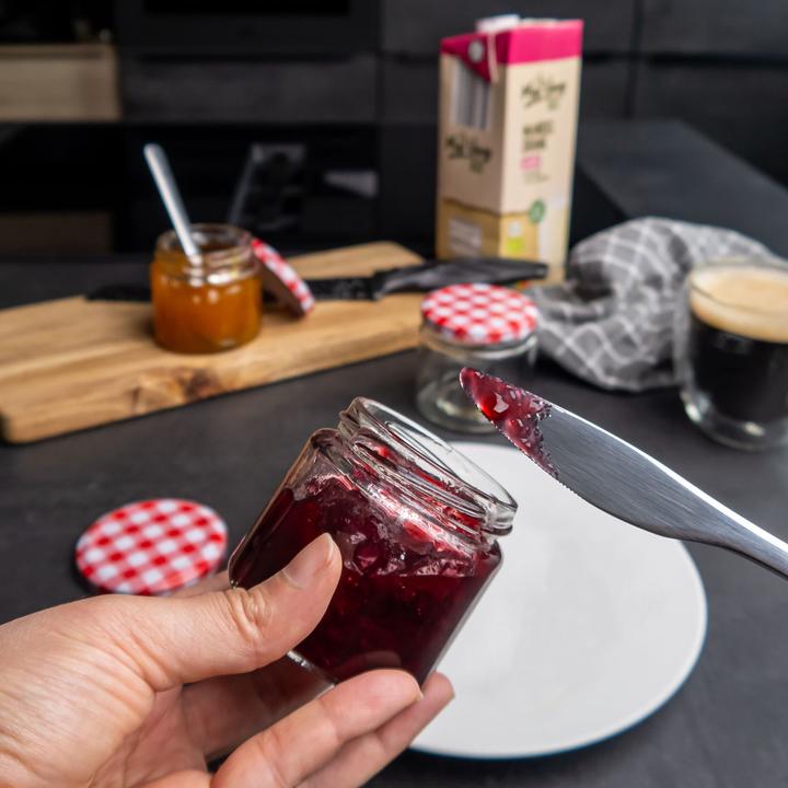 Actual product image Intirilife Preserving set: Stainless steel strainer with 3 sieve inserts & 25 preserving jars & cherry pitter