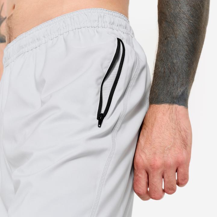 Image du produit Domyos Short de fitness respirant poches zippés homme, gris perle (XL)