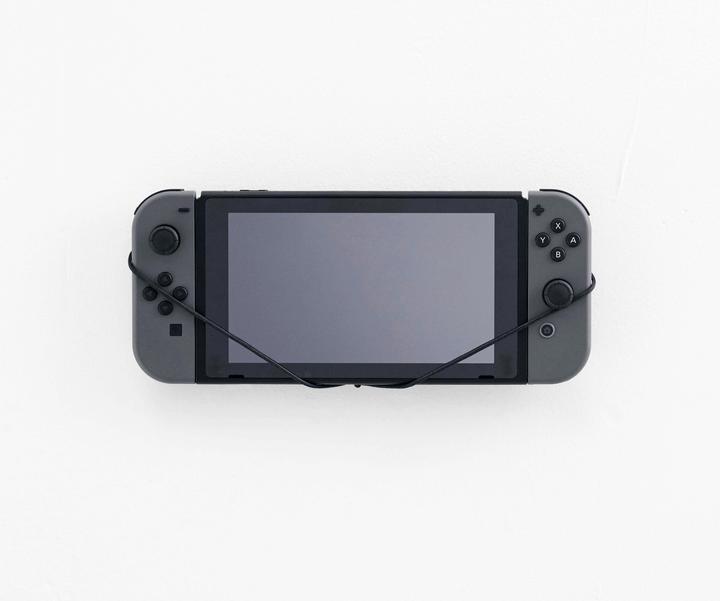 Actual product image Floating Grip Nintendo Switch Console wall mount by, Black (Switch)