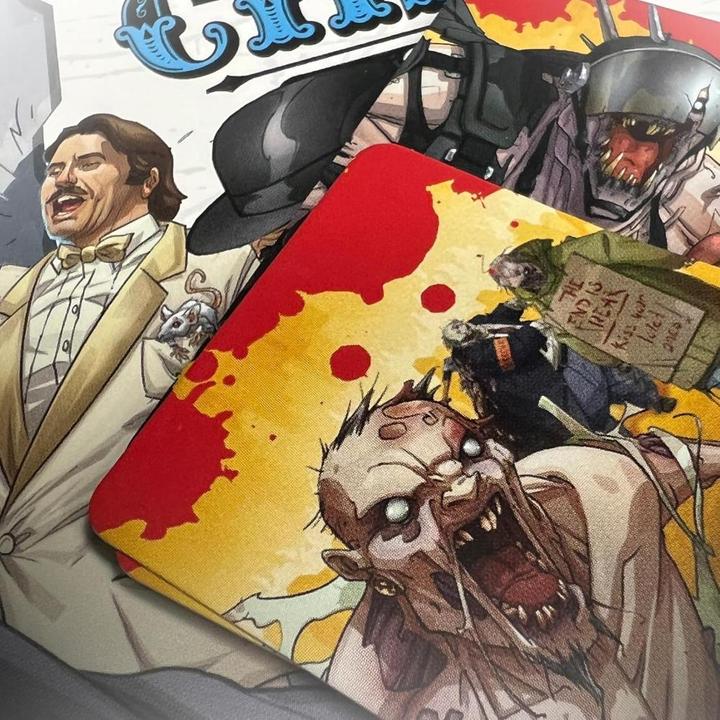 Immagine prodotto Cmon CMND1261 - Zombicide 2a Edizione Circo Volante Monty Python (Tedesco)