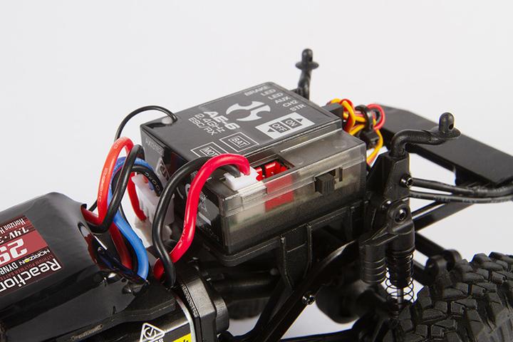 Image du produit Axial SCX24 Deadbolt Electric Brushed Crawler 4WD 1:24 RTR rouge (RTR Prêt à fonctionner)