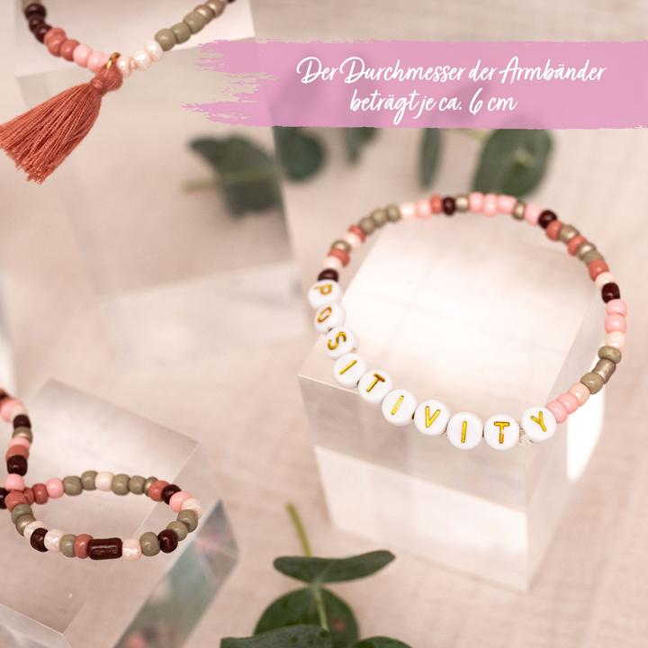 Produktbild Papierdrachen 4 Perlenarmbänder – POSITIVITY und SELFLOVE (Kunststoff, Gummi, Stoff)