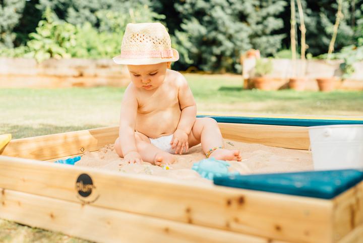 Actual product image Plum Play sandbox with storage compartment and protective cover