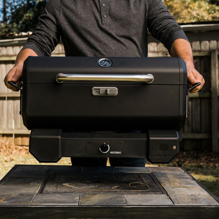 Immagine prodotto Masterbuilt Barbecue e affumicatore a carbonella portatile con Ca