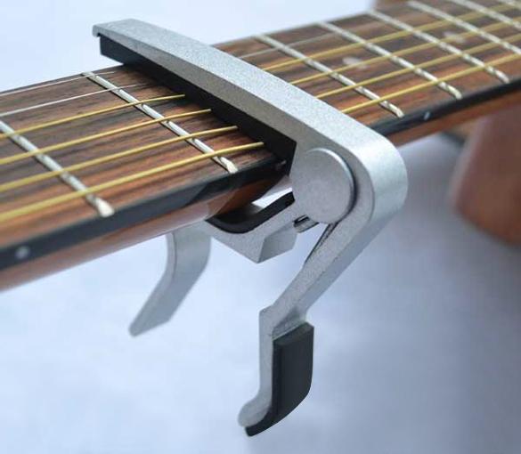 Immagine prodotto JTI Capotasto per chitarra - argento (Capo)