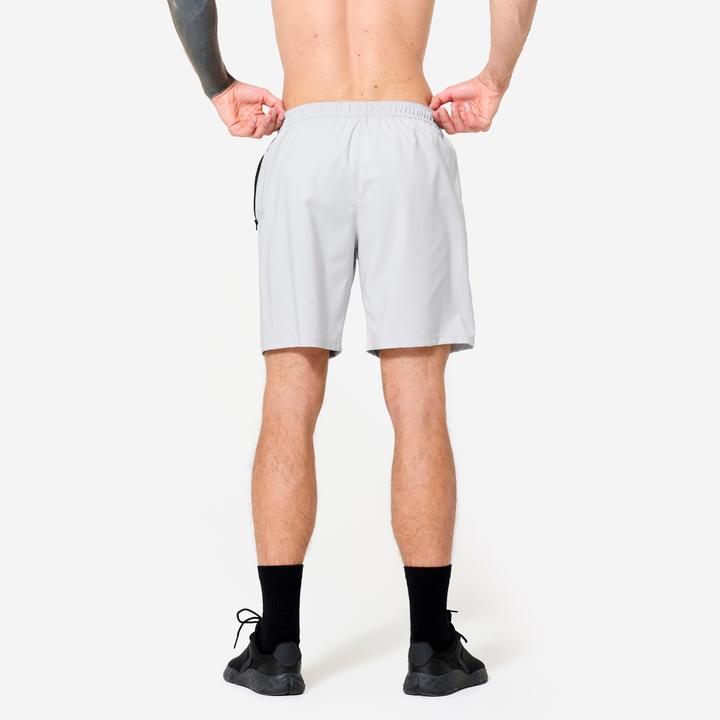Image du produit Domyos Short de fitness respirant poches zippés homme, gris perle (XL)