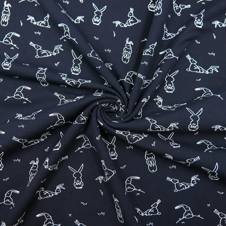 Actual product image Stoffrestposten Cotton jersey - Kamasutra rabbit on white - Minimum quantity: 1 metre
